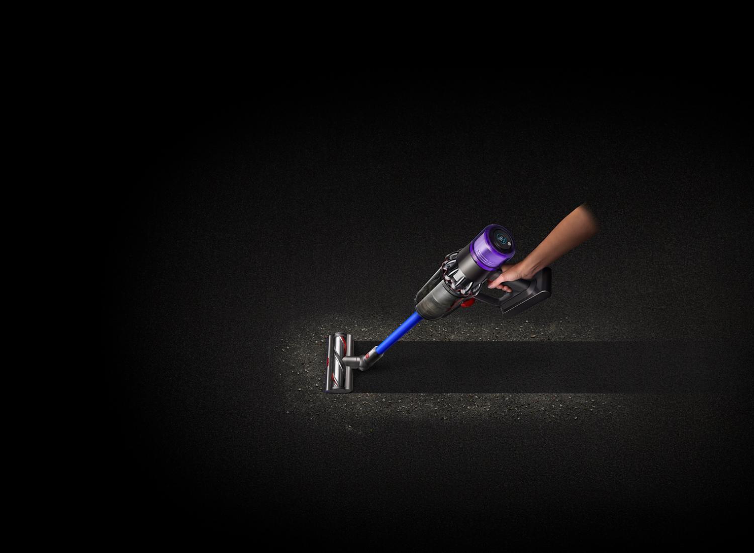 Dyson V11 Absolute vacuum side view cleaning carpet